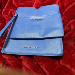 Cynthia Rowley Blue Clutches and Wristlets with Elegant Gold Hardware